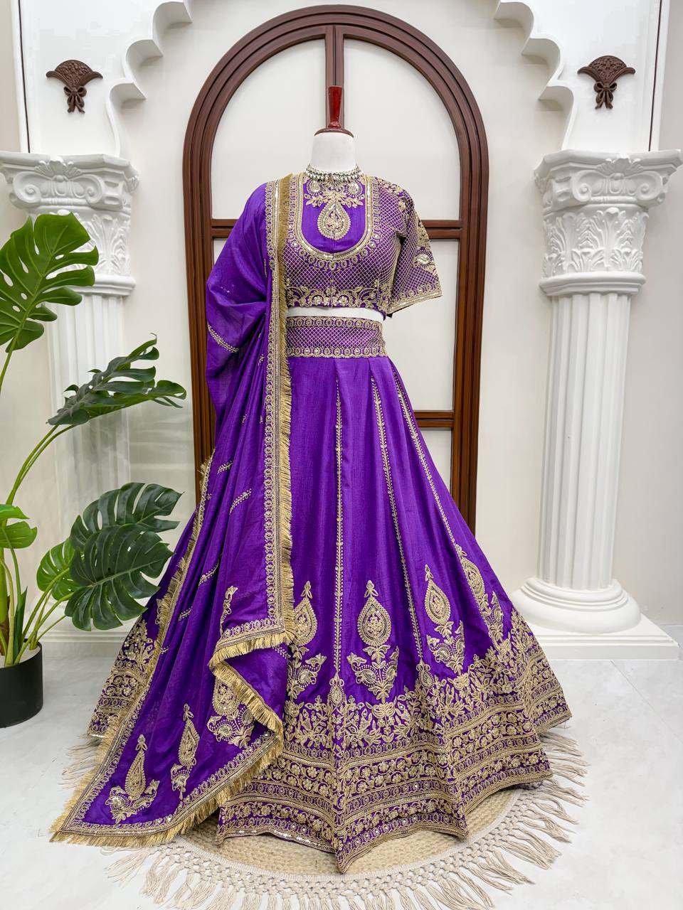 Royal Amethyst Purple Silk Lehenga Choli with Majestic Gold Zari Heritage Motifs and Elaborate Borders